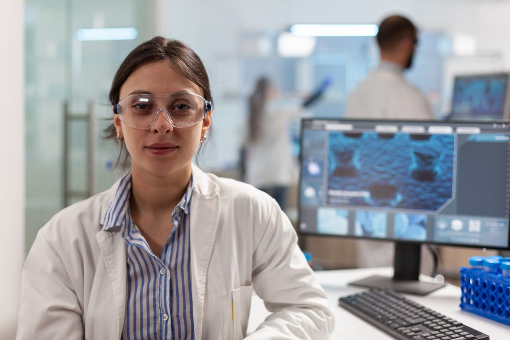 Student next to a computer